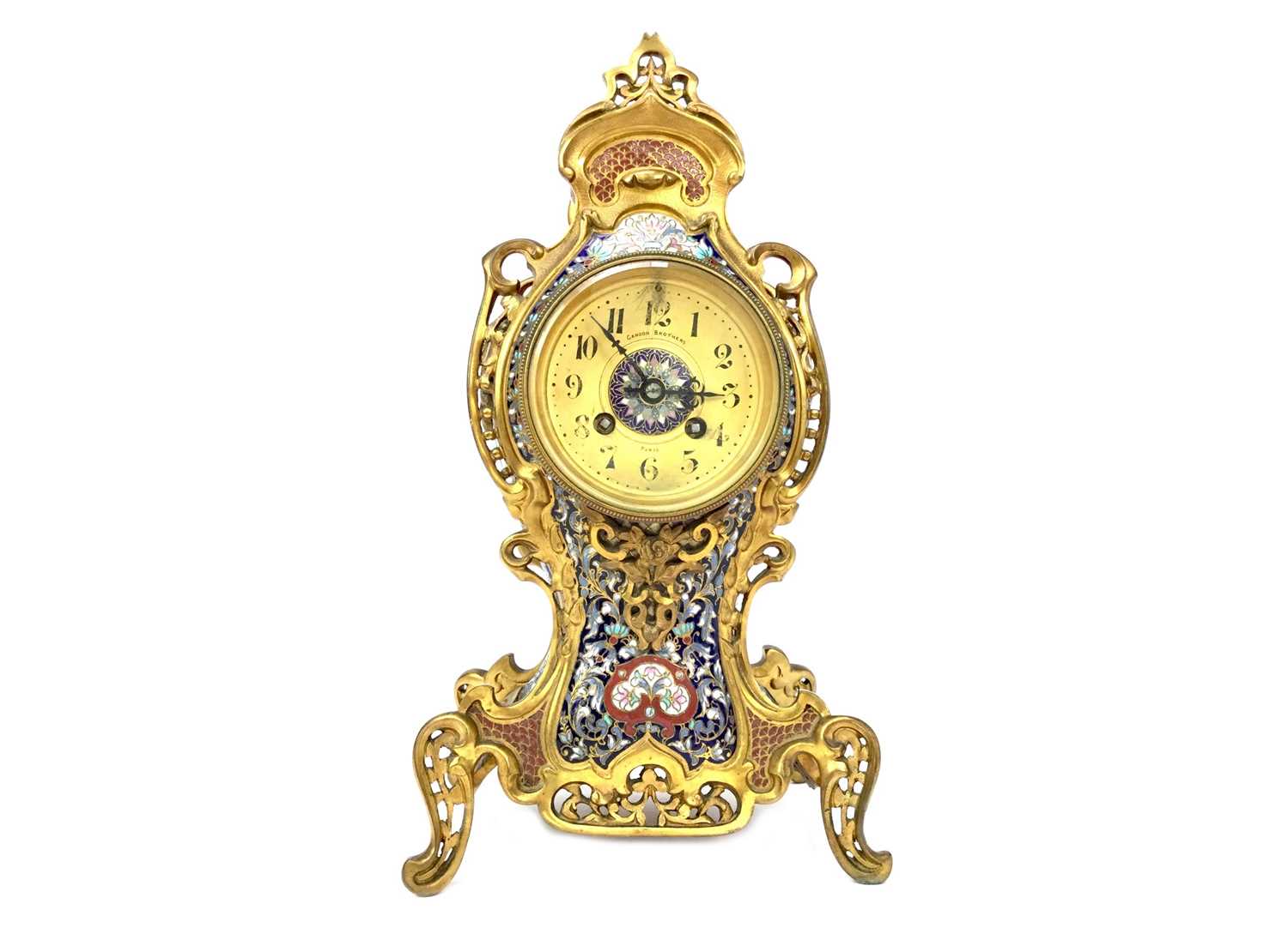 Lot 1108 - A VICTORIAN BRASS AND CHAMPLEVE ENAMEL CLOCK