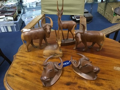 Lot 251 - A LOT OF CARVED WOOD ANTELOPE AND BISON MODELS