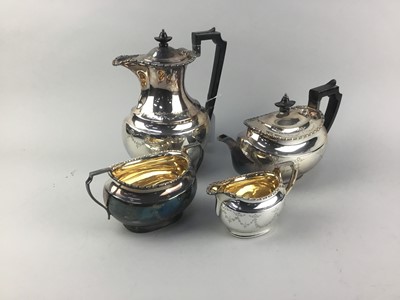 Lot 312 - A SILVER PLATED FOUR PIECE TEA SERVICE AND A THREE PIECE TEA SERVICE