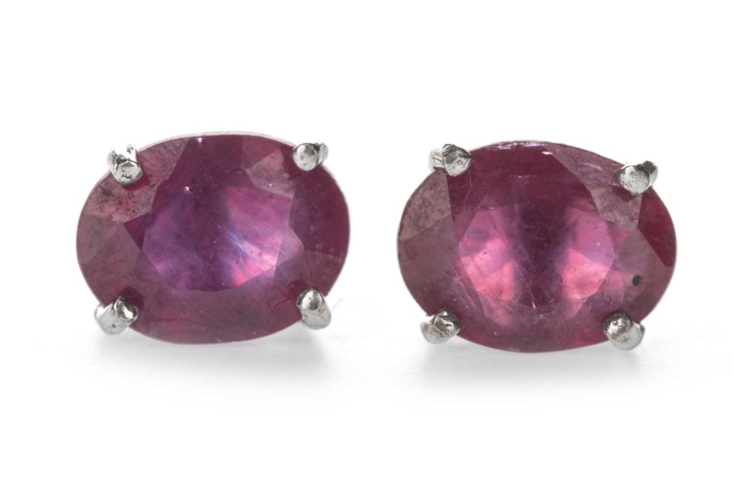 Lot 444 - A PAIR OF TREATED RUBY EARRINGS