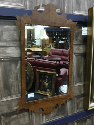 Lot 361 - A WALL MIRROR IN A WALNUT FRAME