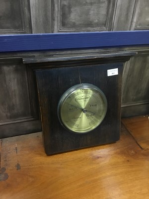 Lot 363 - A MID 20TH CENTURY OAK FRAMED WALL BAROMETER