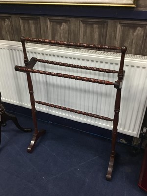 Lot 354 - A STAINED BEECH TOWEL RAIL