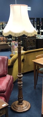 Lot 356 - A WALNUT STANDARD LAMP