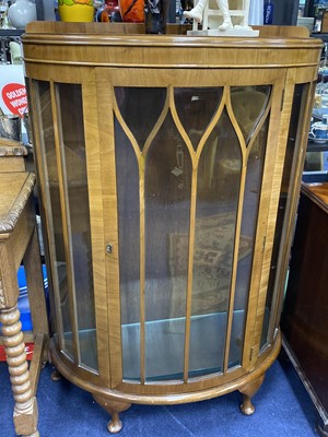 Lot 357 - A WALNUT DISPLAY CABINET