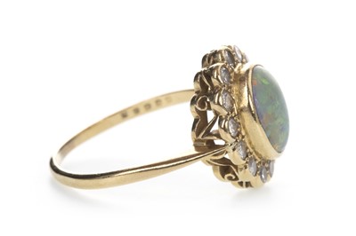 Lot 826 - AN OPAL AND DIAMOND RING