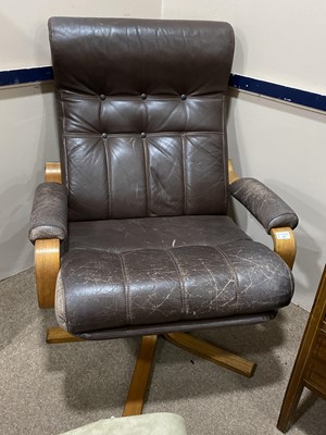 Lot 332 - A LEATHER SWIVEL ARMCHAIR