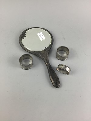 Lot 344 - A SILVER VANITY MIRROR AND THREE SILVER NAPKIN RINGS