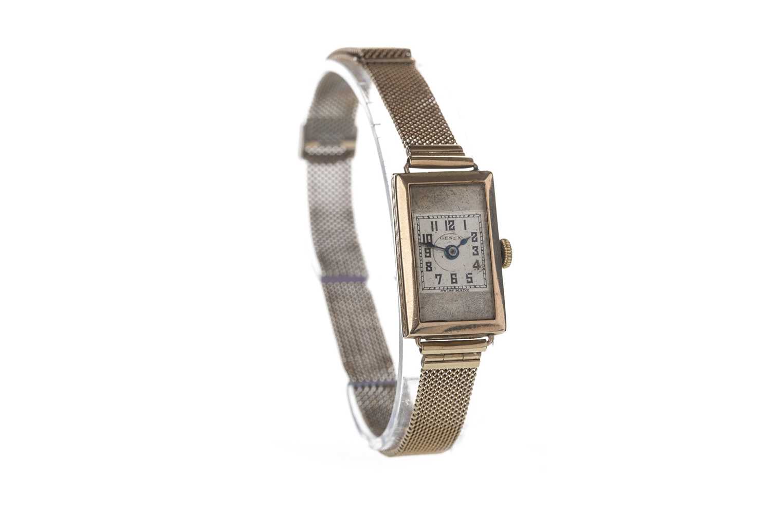 Lot 705 - A LADY'S GENEX NINE CARAT GOLD MANUAL WIND