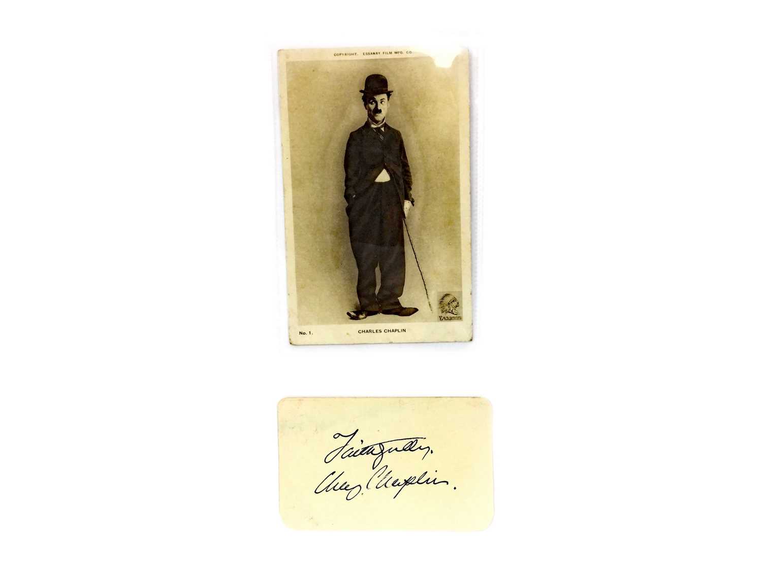 Lot 1317 - AN AUTOGRAPH ALBUM PAGE SIGNED BY CHARLIE CHAPLIN AND ANOTHER