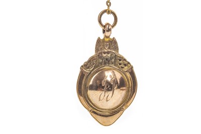Lot 1724 - AN EARLY 20TH CENTURY NINE CARAT GOLD FOB MEDAL