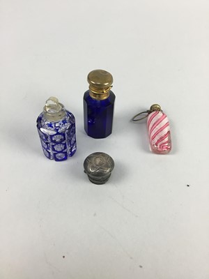 Lot 3 - A COLLECTION OF FIVE COLOURED GLASS SCENT BOTTLES