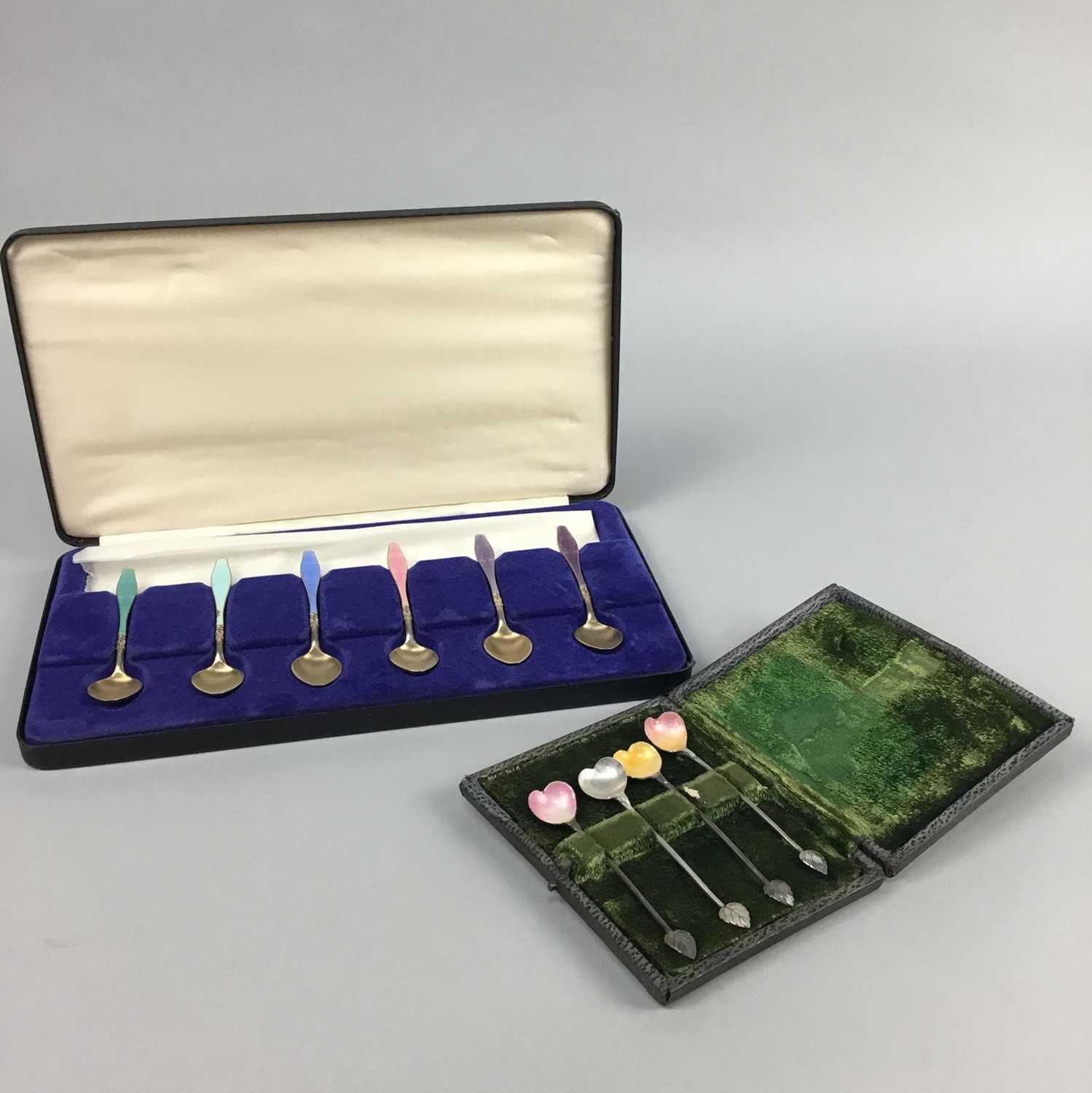 Lot 4 - A CASED SET OF SIX SILVER AND ENAMEL TEASPOONS AND ANOTHER