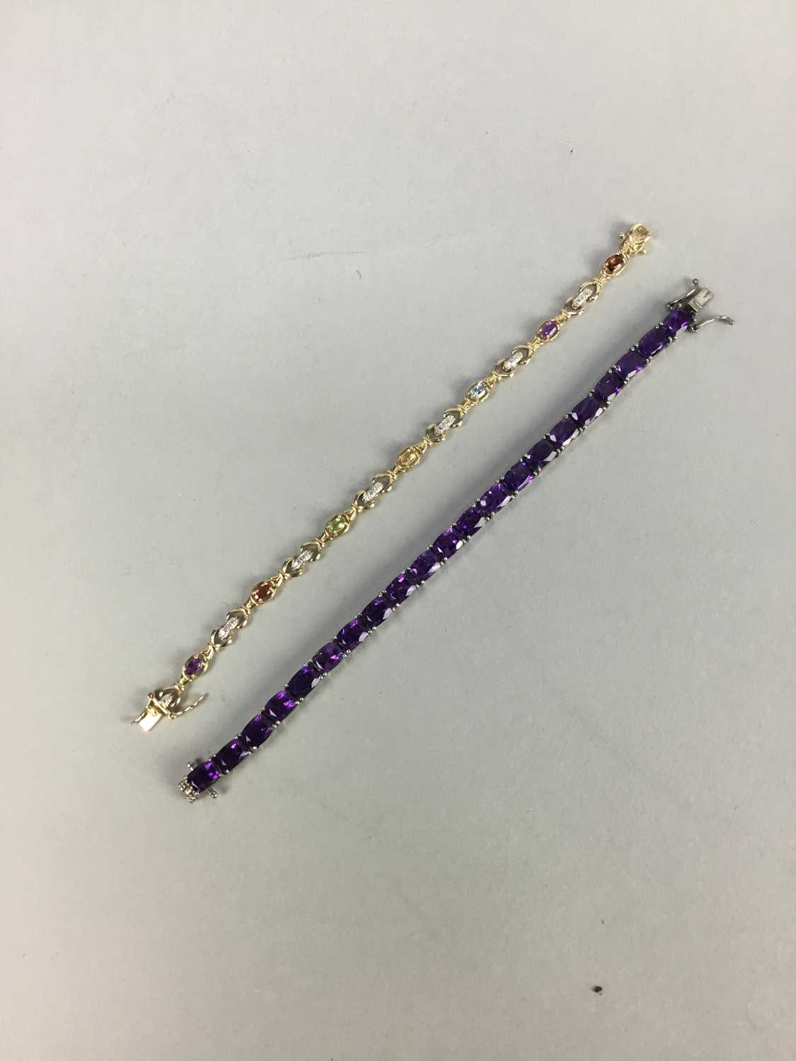 Lot 19 - A SILVER AMETHYST SET BRACELET AND ANOTHER