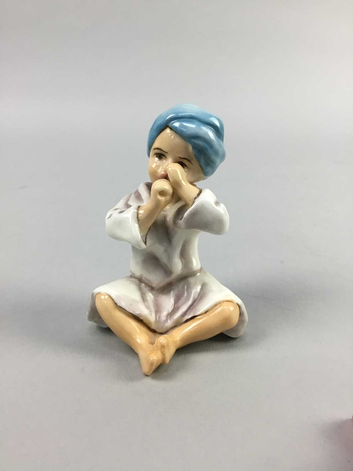 Lot 24 - A ROYAL WORCESTER FIGURE OF 'INDIA'