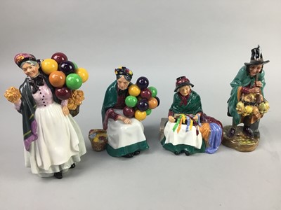 Lot 25 - A ROYAL DOULTON FIGURE OF 'THE MASK SELLER' AND THREE OTHERS