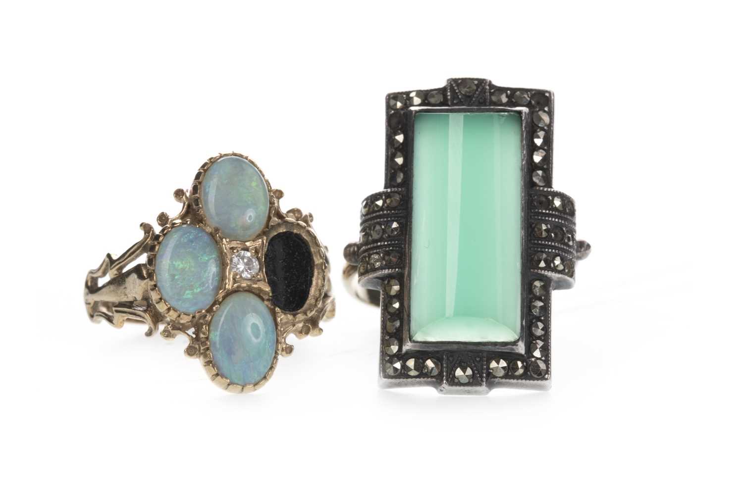 Lot 835 - A PARTIAL OPAL RING AND A GREEN HARDSTONE AND MARCASITE RING