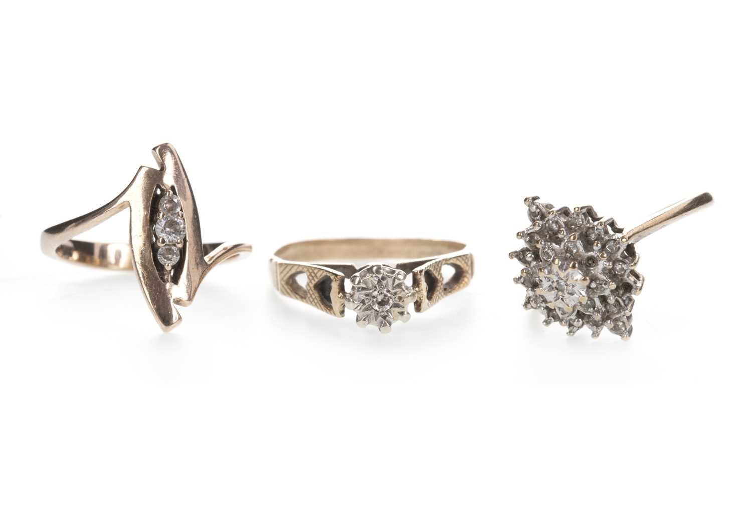Lot 859 - TWO DIAMOND RINGS AND A WHITE GEM SET RING