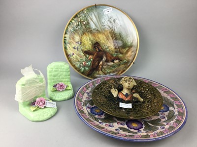 Lot 99 - A CHARLOTTE RHEAD CERAMIC CHARGER ALONG WITH ANOTHER PLATE AND BOOKENDS