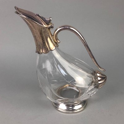 Lot 88 - A SILVER PLATED AND GLASS CLARET JUG
