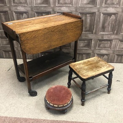 Lot 284 - AN OAK TWO TIER TROLLEY AND TWO STOOLS