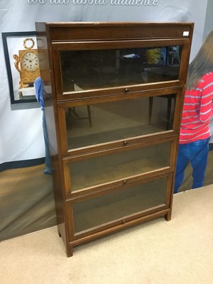 Lot 1399 - AN EARLY 20TH CENTURY OAK SECTIONAL BOOKCASE