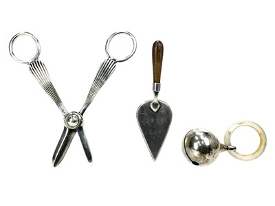 Lot 430 - A PAIR OF EARLY 20TH CENTURY SILVER GRAPE SCISSORS ALONG WITH A RATTLE AND PRESENTATION TROWEL