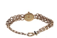 Lot 106 - LADY'S NINE CARAT GOLD DIAMOND SET QUARTZ...