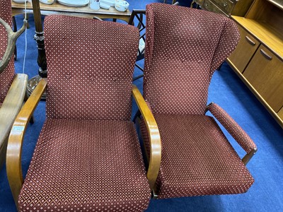 Lot 334 - A PAIR OF TEAK FRAMED ARMCHAIRS AND TWO SIMILAR ARMCHAIRS