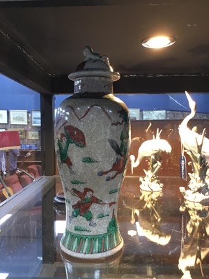 Lot 374 - A CHINESE CRACKLE GLAZE VASE AND COVER
