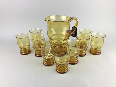 Lot 376 - AN AMBER GLASS LEMONADE SET ALONG WITH CHAMPAGNE COUPES AND OTHER CERAMICS