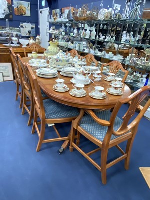 Lot 400 - A MODERN YEW WOOD DINING SUITE