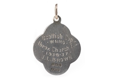 Lot 1766 - A SCOTTISH CHURCHES FOOTBALL ASSOCIATION SCOTTISH CUP WINNERS SILVER MEDAL 1937