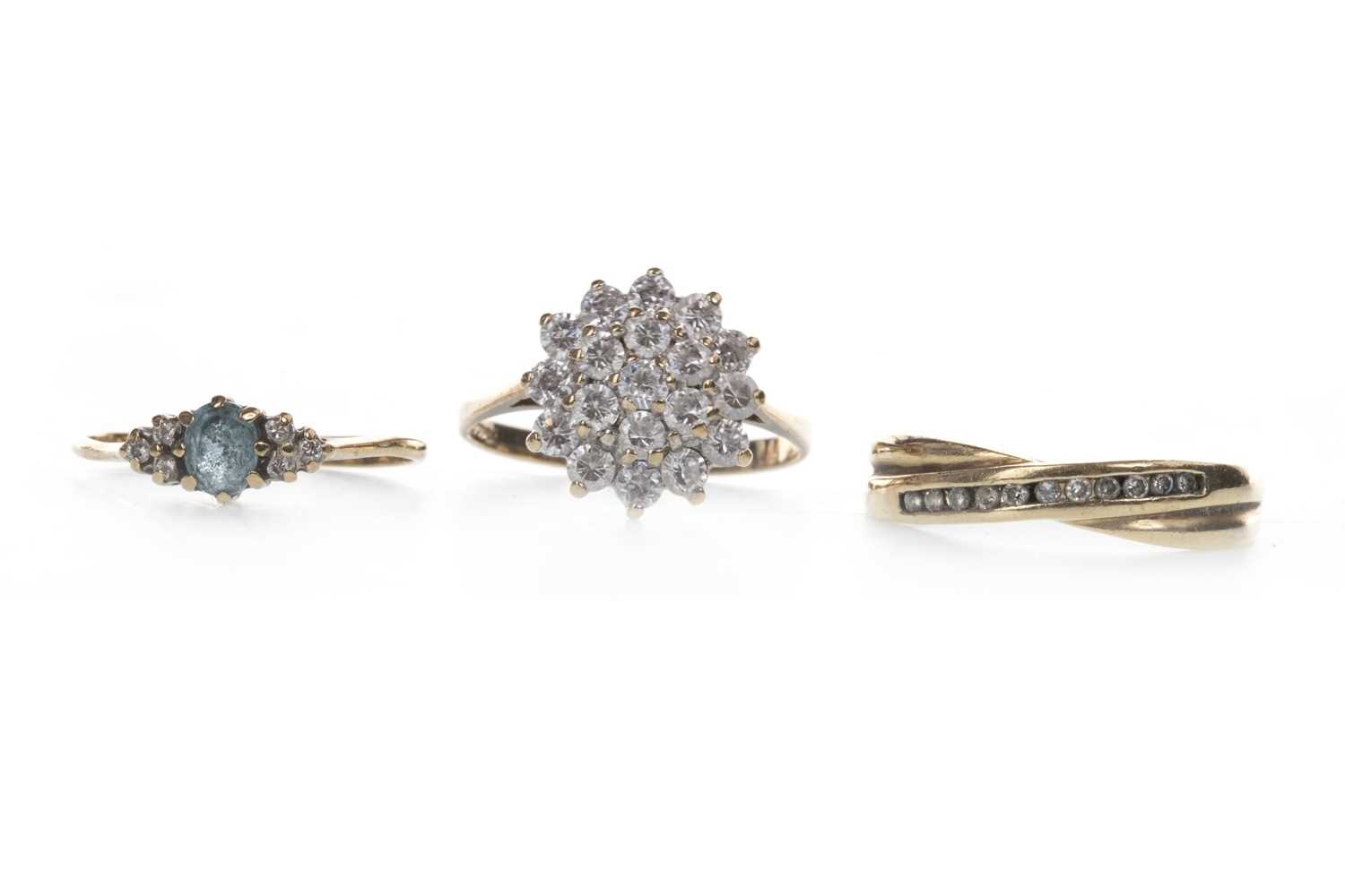 Lot 914 - TWO DIAMOND RINGS AND A GEM SET CLUSTER RING