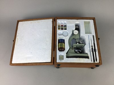 Lot 22 - A VINTAGE MICROSCOPE IN CASE AND ANOTHER INSTRUMENT