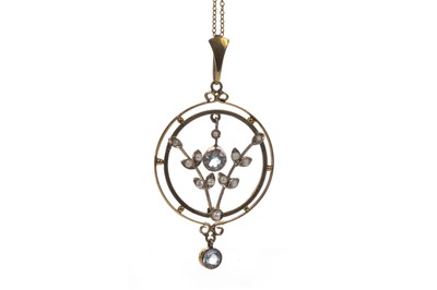 Lot 924 - EARLY TWENTIETH CENTURY BLUE GEM SET AND SEED PEARL PENDANT