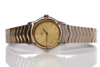 Lot 155 - LADY'S STAINLESS STEEL AND EIGHTEEN CARAT GOLD...