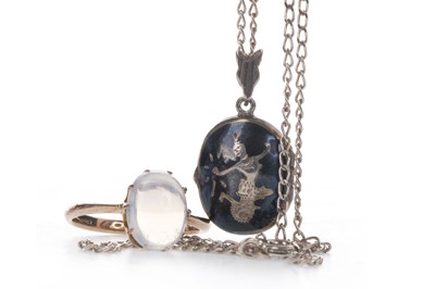 Lot 936 - A MOONSTONE RING AND A LOCKET ON CHAIN