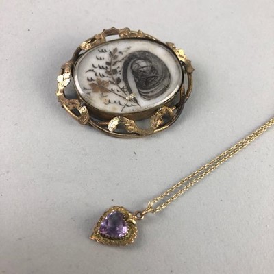 Lot 2 - A VICTORIAN OVAL MOURNING BROOCH AND AND PENDANT ON CHAIN
