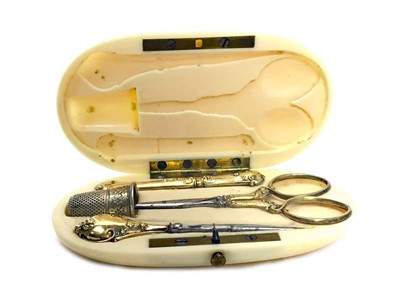 Lot 438 - A LATE 19TH CENTURY FRENCH IVORY CASED SEWING KIT