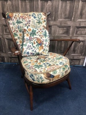 Lot 210 - AN ERCOL FRAMED ARMCHAIR AND A MAHOGANY PIANO STOOL