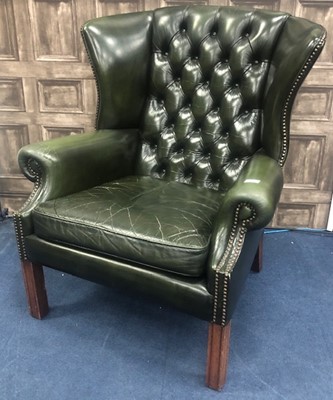 Lot 201 - A 20TH CENTURY GREEN LEATHER WING BACK ARMCHAIR