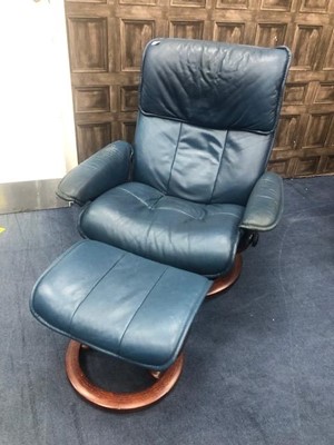Lot 200 - A BLUE LEATHER RECLINING CHAIR AND MATCHING FOOTSTOOL