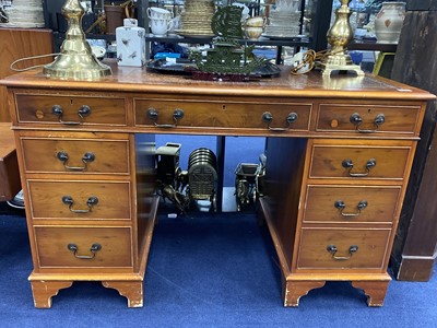 Lot 204 - A 20TH CENTURY STAINED WOOD KNEE HOLE DESK