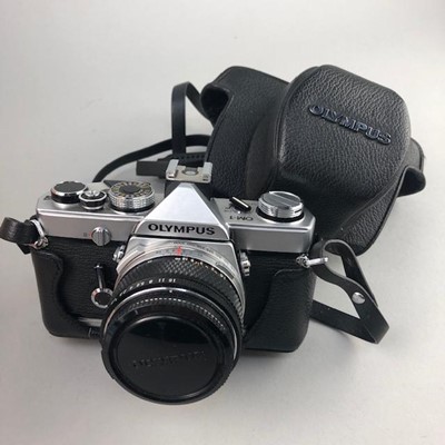 Lot 149 - AN OLYMPUS CAMERA, WITH ACCESSORIES