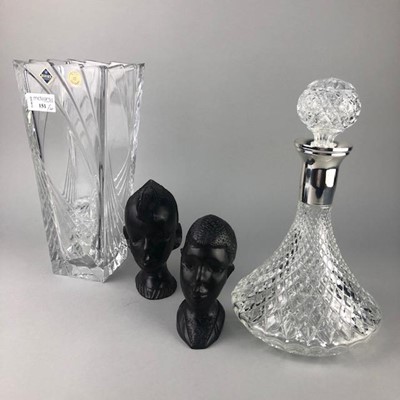 Lot 151 - A BOHEMIA CRYSTAL VASE, DECANTER AND TWO TRIBAL HEADS