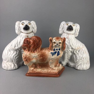 Lot 105 - A PAIR OF STONEWARE WALLY DOGS AND ANOTHER