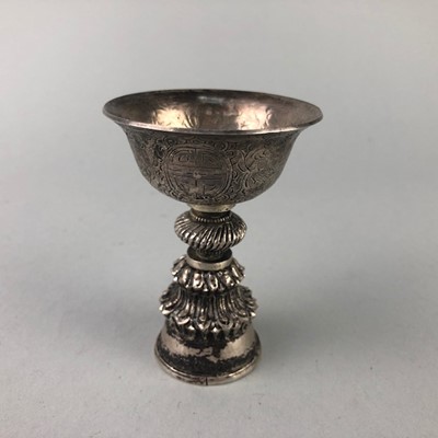 Lot 229 - A TIBETAN WHITE METAL LIBATION CUP