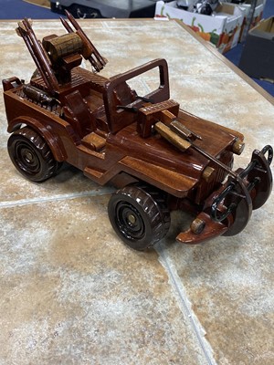 Lot 169 - A STAINED WOOD MODEL OF A TANK AND OTHER MODEL VEHICLES