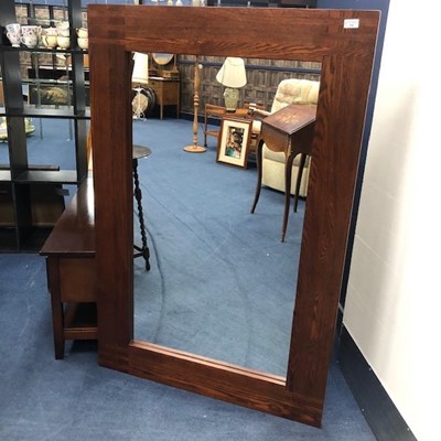 Lot 150 - A LARGE STAINED WOOD WALL MIRROR